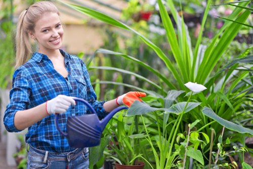 Team member preparing tools for garden maintenance