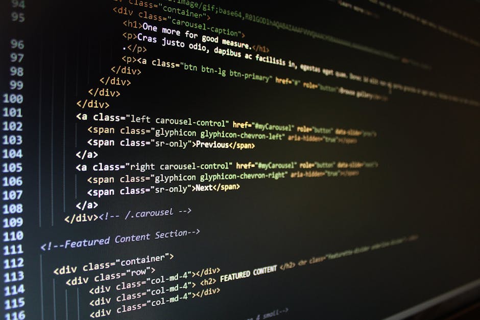 A close-up view of a computer screen displaying HTML code, with lines of tags and attributes in various colors on a dark background, indicative of website development or coding work.