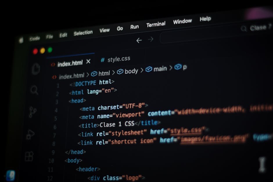 A close-up view of a computer screen displaying HTML code, with lines of tags and attributes in various colors on a dark background, indicative of website development or coding work.